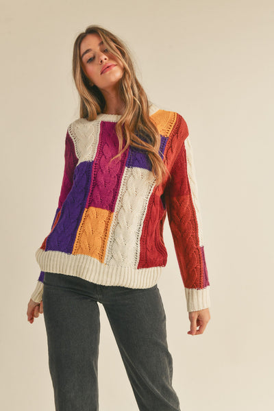 COLOR BLOCK CABLE KNIT SWEATER