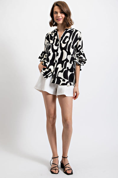 Geometric print ruffle bell sleeve top