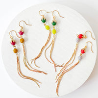 Long glass Bead and Gold Tassel Earrings