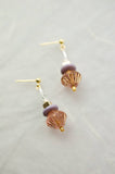 Pink and gold beaded dangle earrings