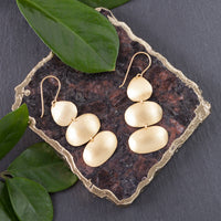 Brushed brass triple pod
