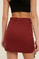 RIBBED KNIT MINI SKIRT WITH RUCHED DETAIL
