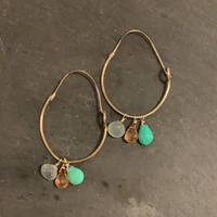 Hand formed hoops with gems
